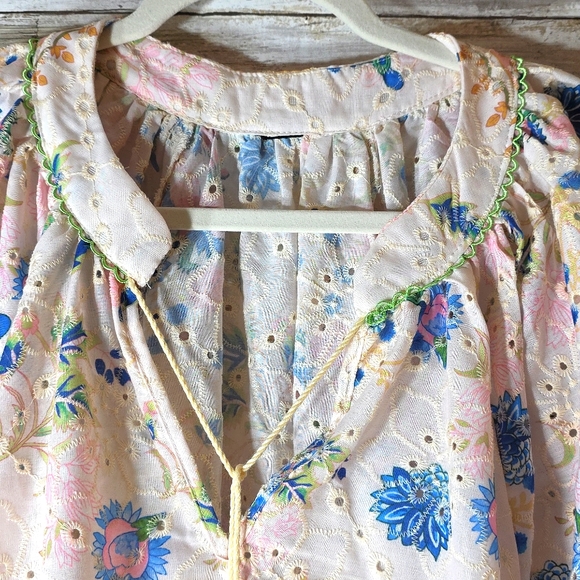 Floral Bohemian Blouse with Tassel and Puffy Sleeves - Picture 7 of 9